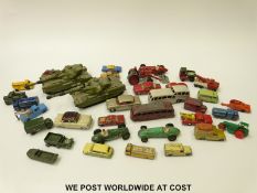 Thirty-six Dinky, Corgi and Matchbox diecast model vehicles including military, Formula 1 cars,
