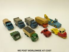 Nine Budgie Toys diecast model vehicles including rubbish wagons and towing truck.