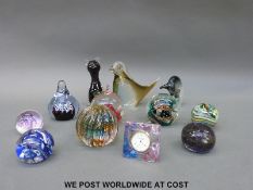 A collection of glass paperweights including Murano, further named Caithness paperweights,