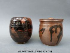 Two studio pottery tobacco jars,