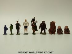 Nine lead figures including four Timpo flock covered animals, Bobby Moore Trendsetter, Robin Hood,
