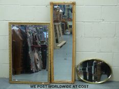 A bevelled glass gilt framed mirror and a bamboo framed example