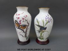 Two large Franklin Mint vases decorated with birds, signed,