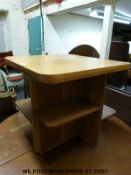 An oak Heals style Art Deco style coffee table with shelves by Bowman Brothers Camden Town (L62 x