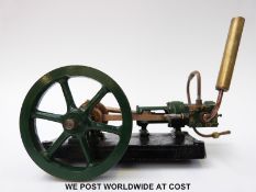 A stationary live steam engine with single cylinder slide valve engine,