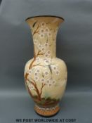 A pair of Chinese floor vases decorated with birds