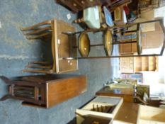 A cake stand, small Sutherland table and a nest of tables.