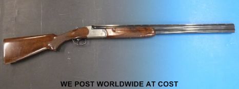 AYA Yeoman 12 bore over and under shotgun with chequered grip,