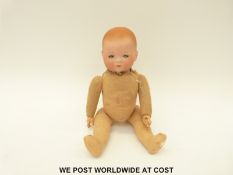 Armand Marseille bisque headed doll with closed mouth, weighted blue eyes,