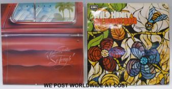 Approximately 50x LPs by The Beach Boys and related artists.