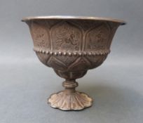 Chinese white metal wine cup with embossed and engraved decoration of animals, on pedestal base,