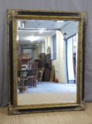 A gold & black painted framed mirror with bevelled edge,