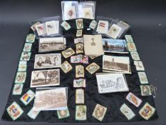 A WWI 1917 Christmas card of Canadian Rifles interest, collection of silks, postcards etc.