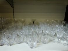 A quantity of cut glass ware to include large retro tapering vase, decanter etc.