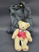 A Lowe Alpine Muon 35 rucksack and a Selfridges teddy bear