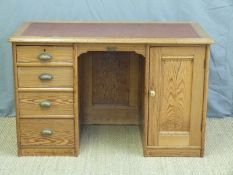 A pitch pine desk with drawers to one side and cupboard to the other,