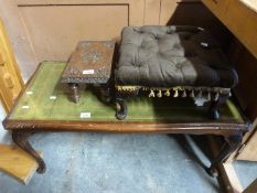 A leather inset coffee table,