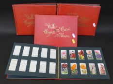 Four albums of Wills cigarette cards including Do You Know, flowers,