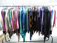 Over one hundred and forty items of clothing consisting of knitwear, some with Oasis, Topshop,