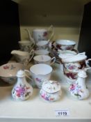 A quantity of tea and coffee ware in floral design to include Royal Albert, Royal Stuart etc.