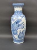 A Chinese blue and white floor vase decorated with peacocks and flowers,