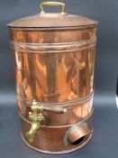A vintage copper tea urn,