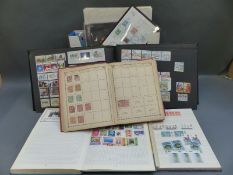 A collection of Victoria stamps on loose album pages, postcard album of Australian stamps,