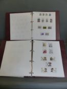 Five Stanley Gibbons albums, comprising Great Britain Volumes 1-4 and Australia Volume 1,