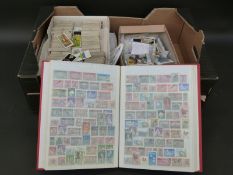 A collection of ephemera including cigarette cards, football trade cards, stamps,