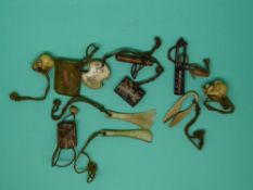 A quantity of small ivory and bone carved novelty miniature oriental items including skull, knife,