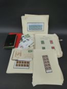 A collection of New Zealand stamps on loose album pages,