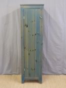 A stained pine tall cupboard (W50 x D36 x H180cm)