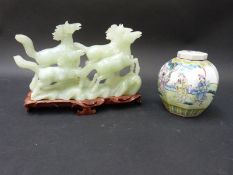 A 19thC Chinese octagonal tea caddy and cover decorated with court scenes (13cm tall) together with