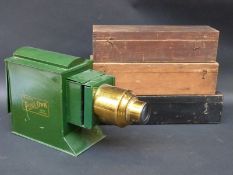 Butcher's Boys Own magic lantern with a collection of slides in three cases.