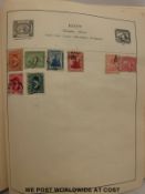 An album of German and Egyptian stamps and three other albums including a well filled all world