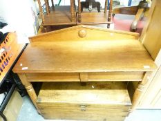 A Victorian light oak hall table with galleried back raised on turned legs (W104 x D40 x H88cm)
