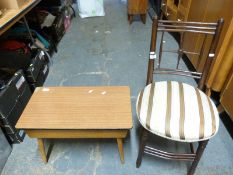 A retro sewing table with contents and a chair