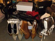 Twenty pairs of boots, one pair in original box, high platforms and decorative designs, Topshop,