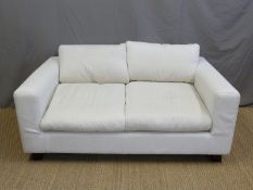 A Habitat three seat sofa bed and matching two seat example