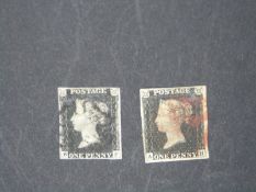 Two 1d black stamps,