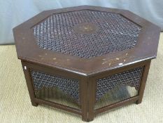 A suite of three Anglo Indian brass inlaid tables with fretwork detail and protective glass tops,