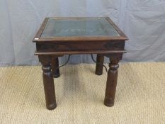 A glass inset occasional table (H60 x W60 x D60cm)