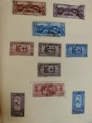 Stamps from Egypt from early issues in an album and on album pages