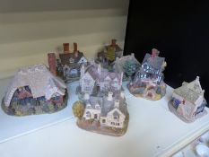 A collection of Lilliput Lane cottages