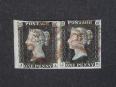 A good 4 margin pair of 1d black stamps JA and JB with light red Maltese Cross cancellation