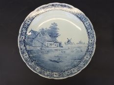 A pair of Delft chargers with Dutch scenes,
