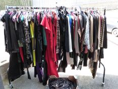 Over one hundred and twenty items of clothing consisting of knitwear, dresses etc.