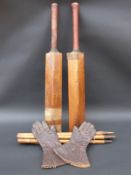 Two vintage cricket bats,