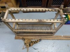 A vintage pine plate rack and a pine and cast iron clothes airer suitable for above a Rayburn or