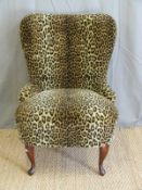 A leopard skin effect retro chair